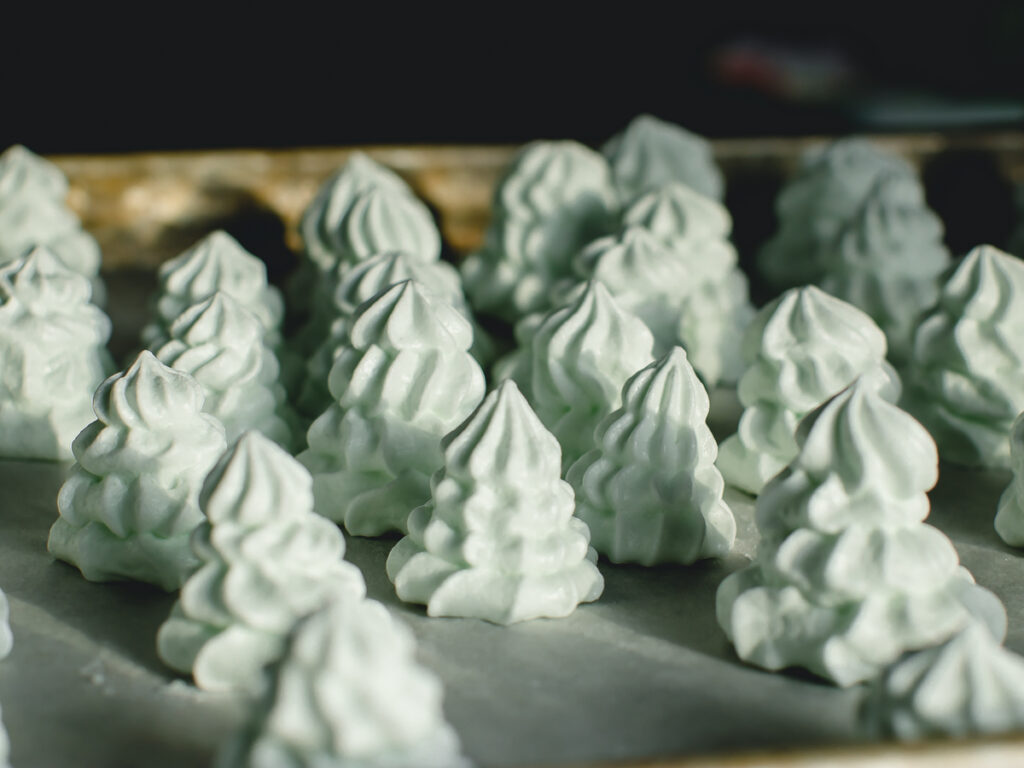 Mint meringue cookies that look like trees.