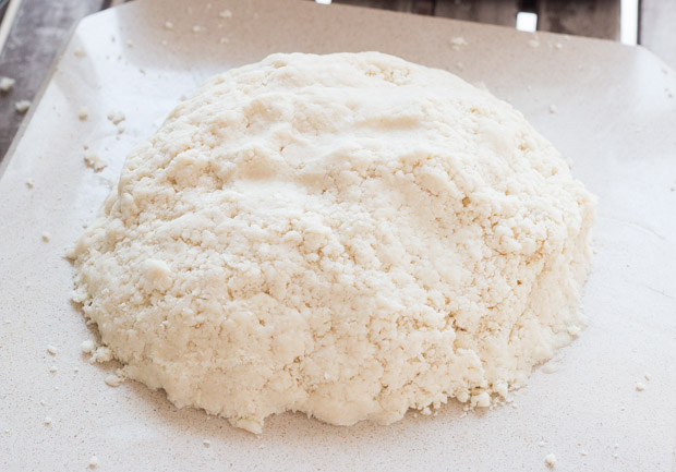 pie dough loose crumbles before being formed.