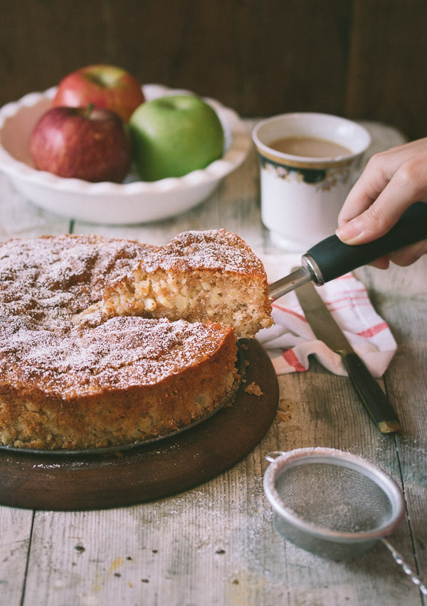 This simple apple cake with slice of cake being lifted out makes the perfect snack for fall.