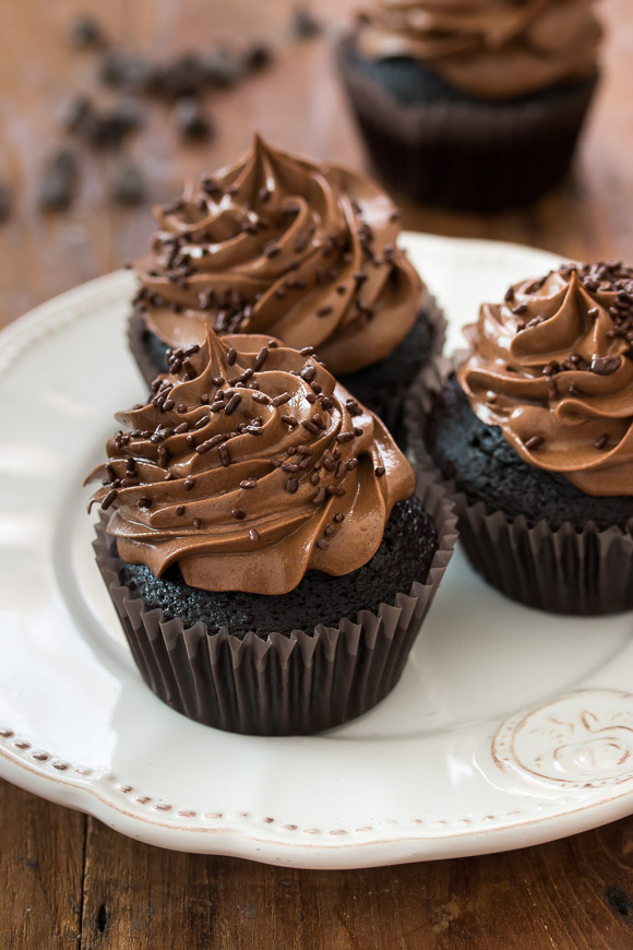 The ultimate chocolate cupcakes - perfectly moist and insanely chocolaty, topped with a supreme fudge chocolate frosting | rosechocolatier.com