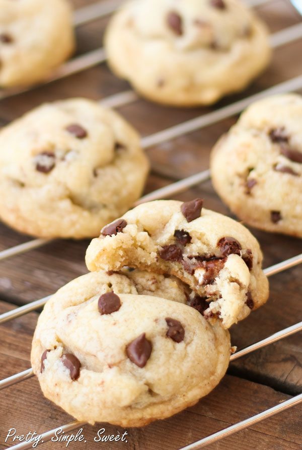 Bite of vanilla Pudding Chocolate Chip Cookie on cooling rack.