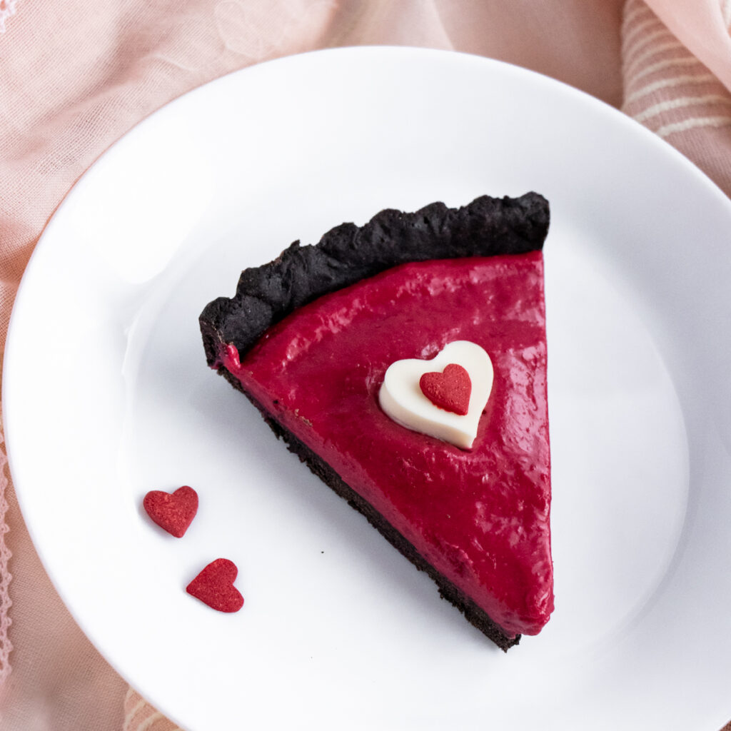 slice of raspberry black cocoa pie