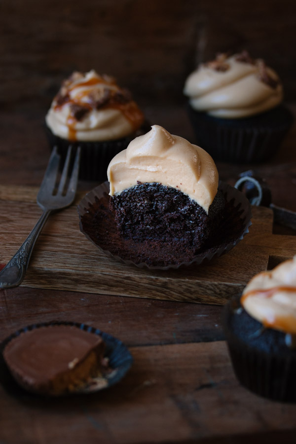 Moist chocolate cupcakes topped with a creamy peanut butter frosting | rosechocolatier.com