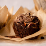 Delicious chocolate muffins made with espresso and topped with crunchy sugar and nut toppings.