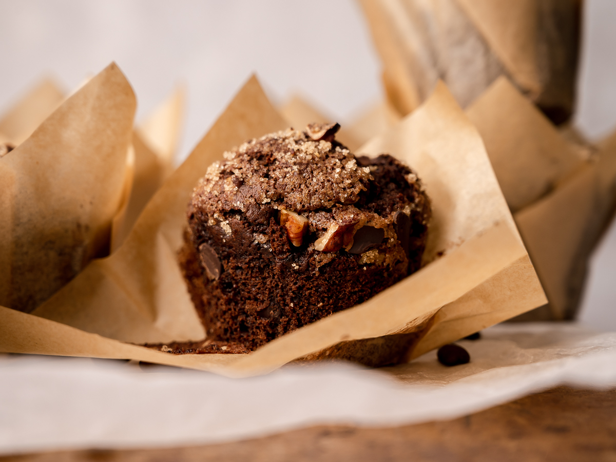 Delicious chocolate muffins made with espresso and topped with crunchy sugar and nut toppings.