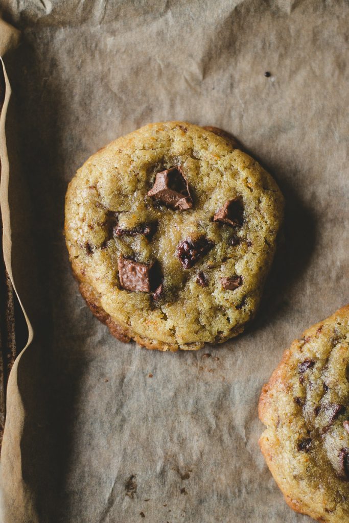 Stunning orange cookies with milk chocolate chunks.