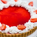 Easy and impressive no-bake strawberry and white chocolate tart with a simple cookie crust.