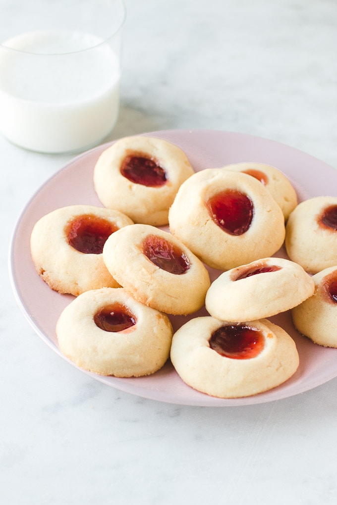 Jam Thumbprint Cookies are tasty and add a pop of color to your cookie tray.