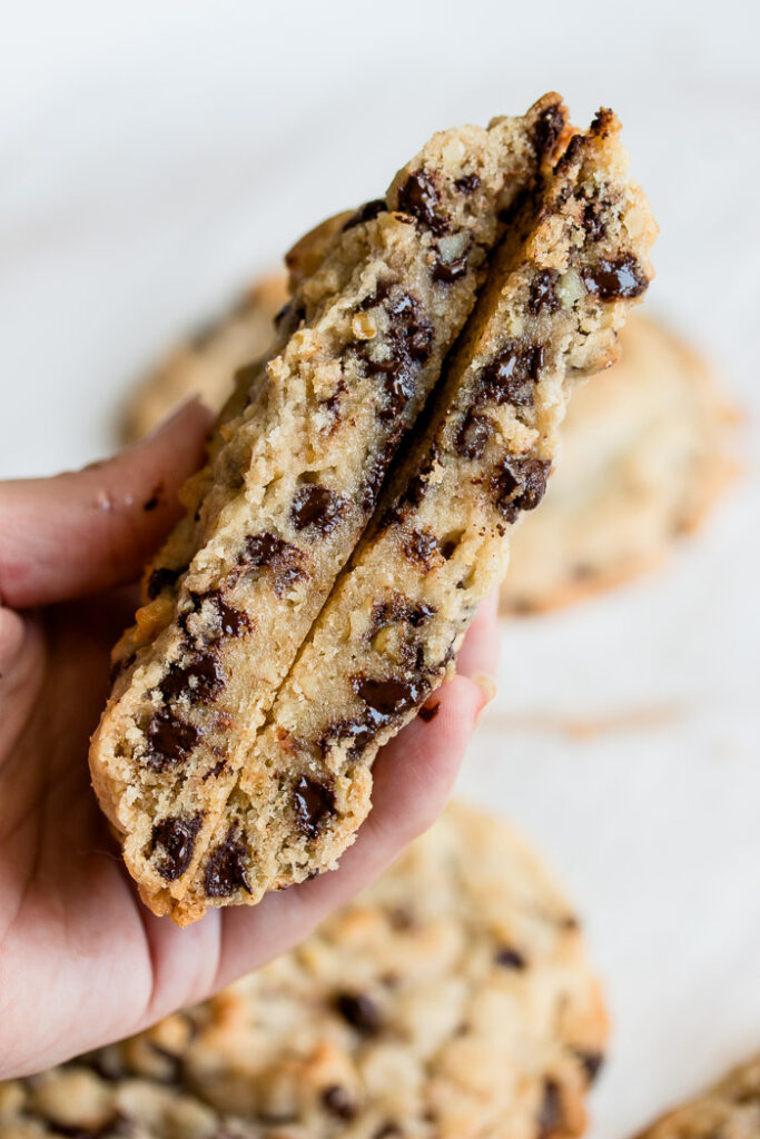 Giant Chocolate Chip Cookies split in half to reveal the thick, large size.