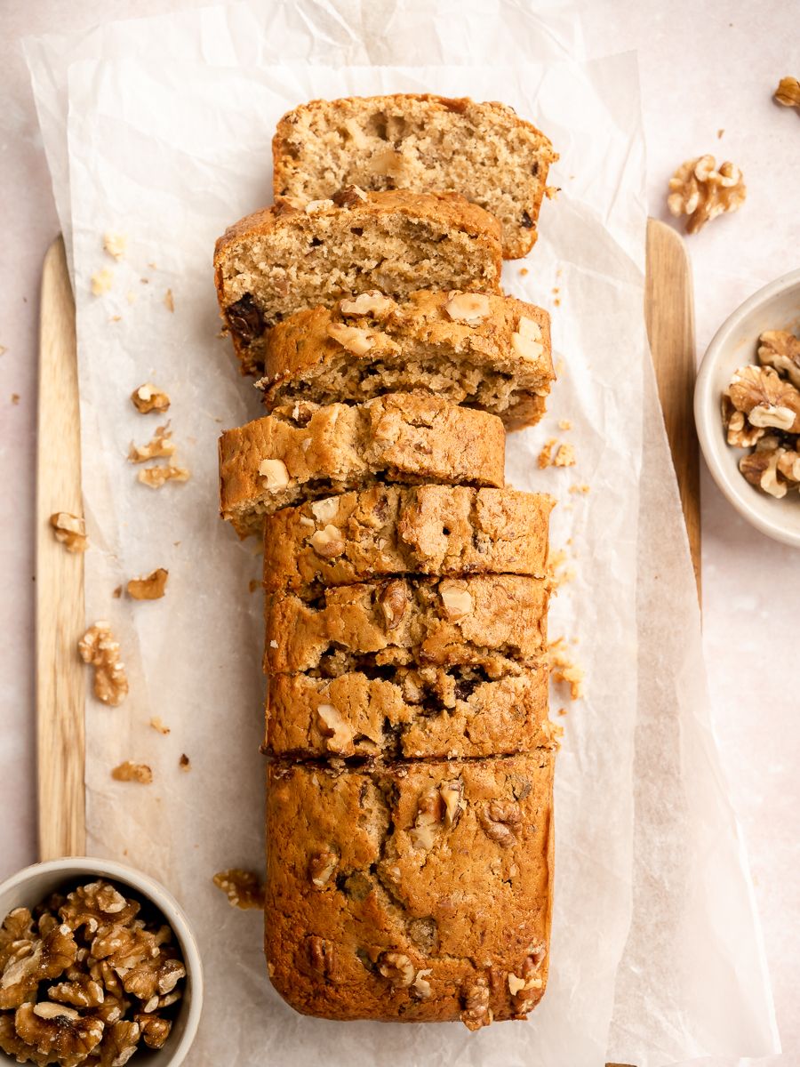 Cake made with espresso or coffee in the batter, sliced to reveal moist and tender inside with pecans and chocolate.