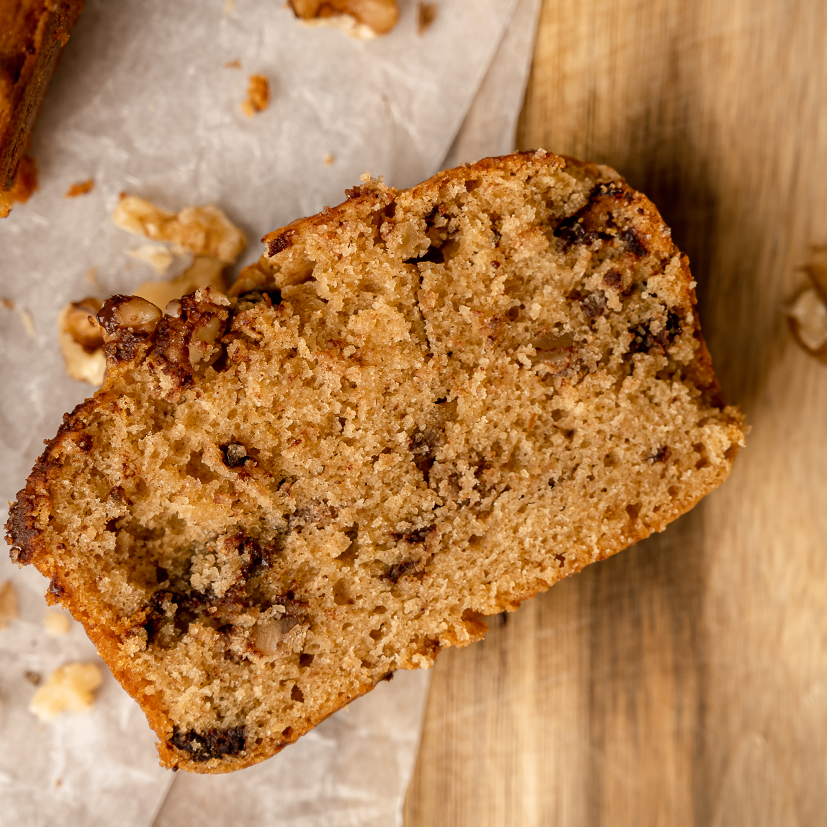 Slice of espresso cake with chocolate and pecans.