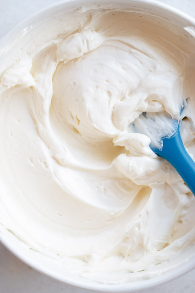 white chocolate swiss meringue buttercream frosting in bowl