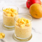 Cold and creamy mango sago tapioca pudding topped with fresh mangos.