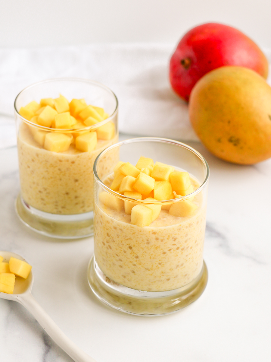 Cold and creamy mango sago tapioca pudding topped with fresh mangos.