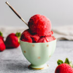 Scoops of strawberry sorbet made with real frozen strawberries.