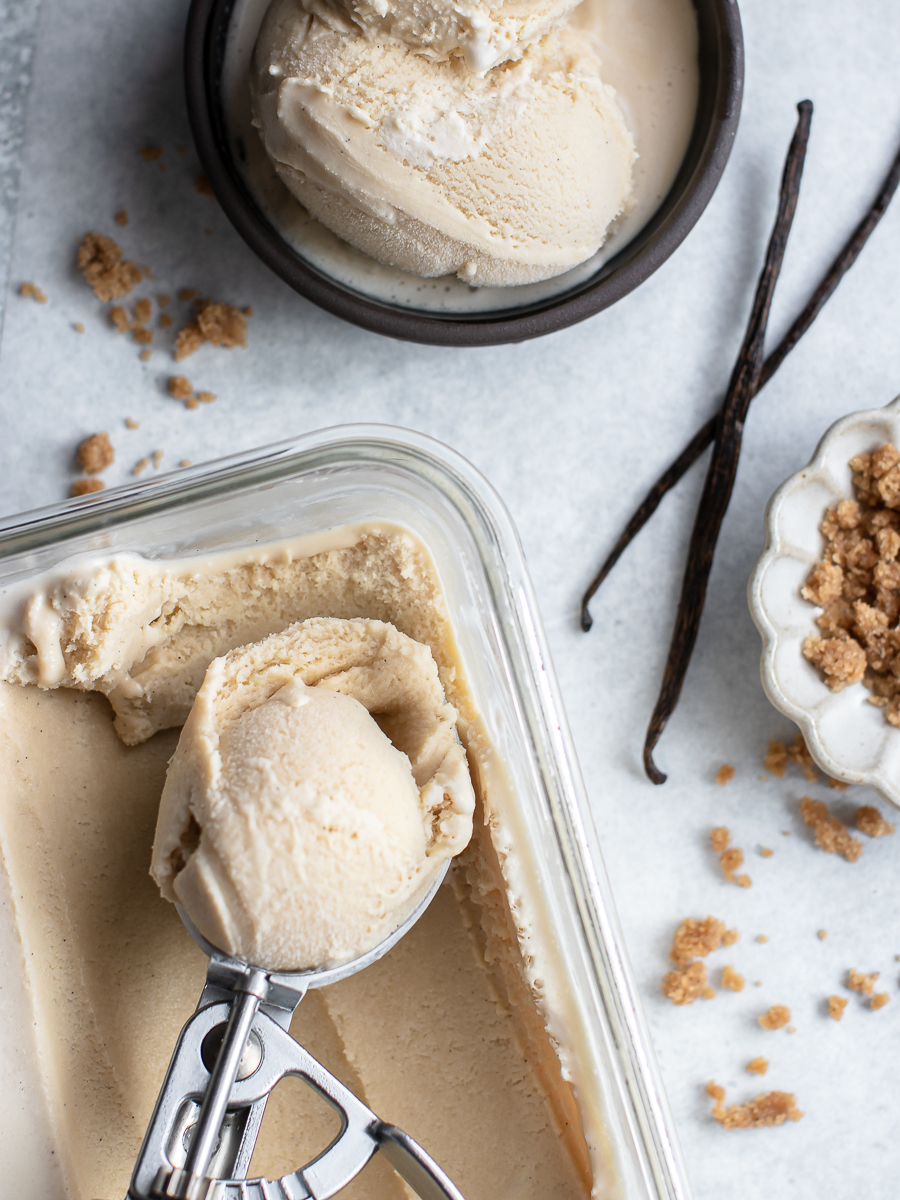 Scoop of frozen custard made with brown sugar and vanilla bean paste.